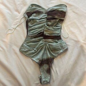 Mesh strapless body suit